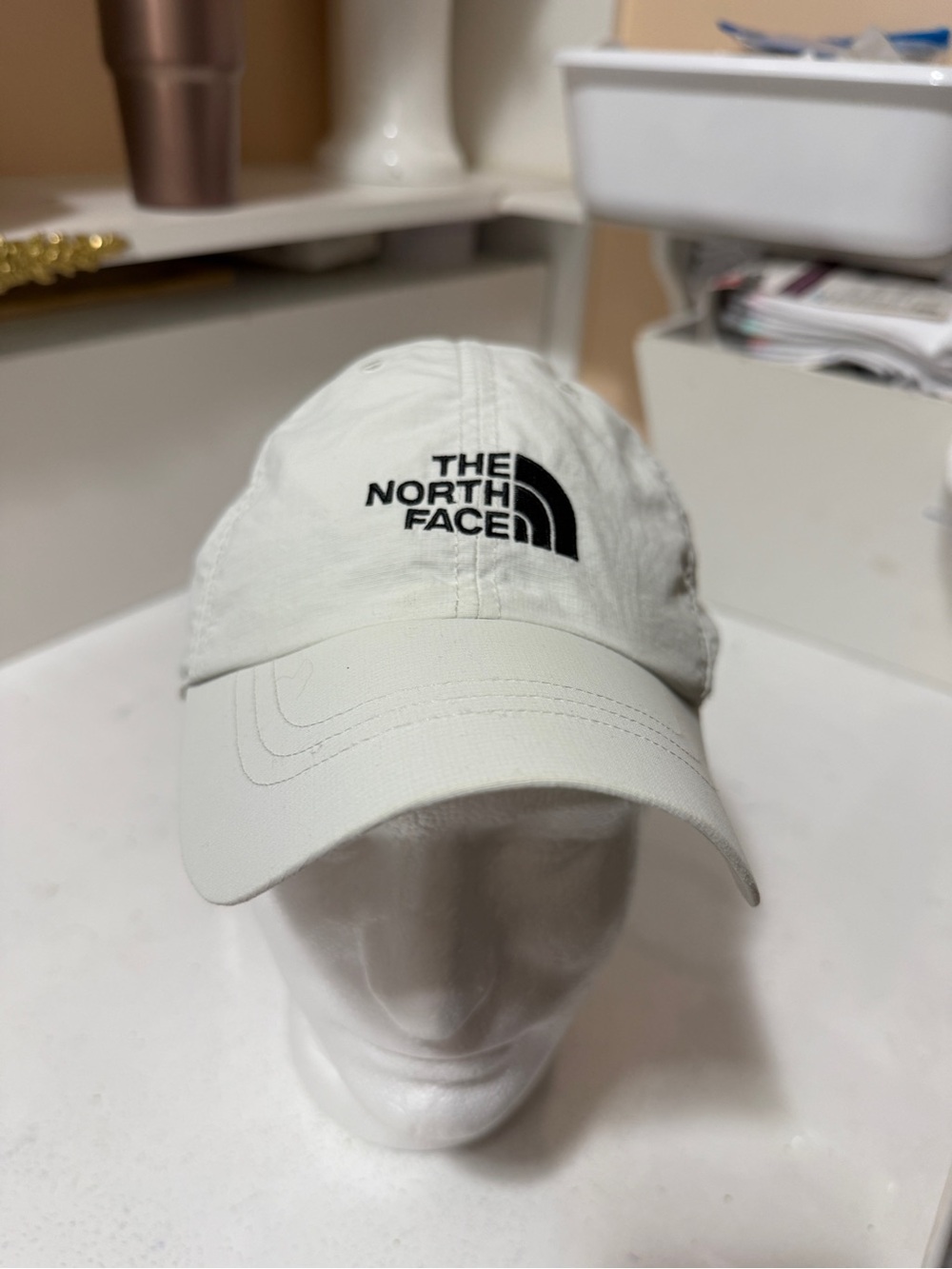 The North Face Off-White Baseball Cap with Black Logo